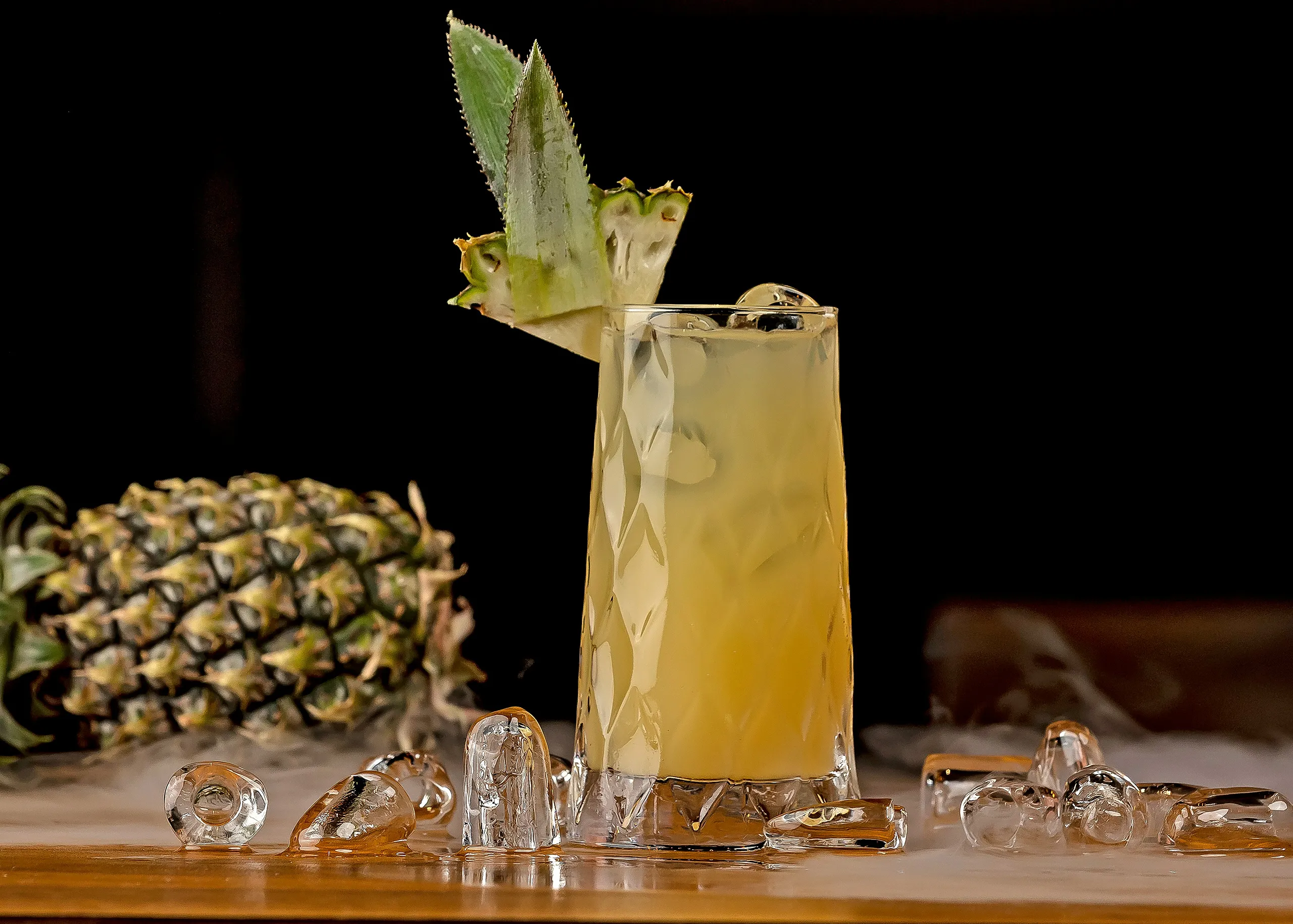 pineapple cocktail on bar top