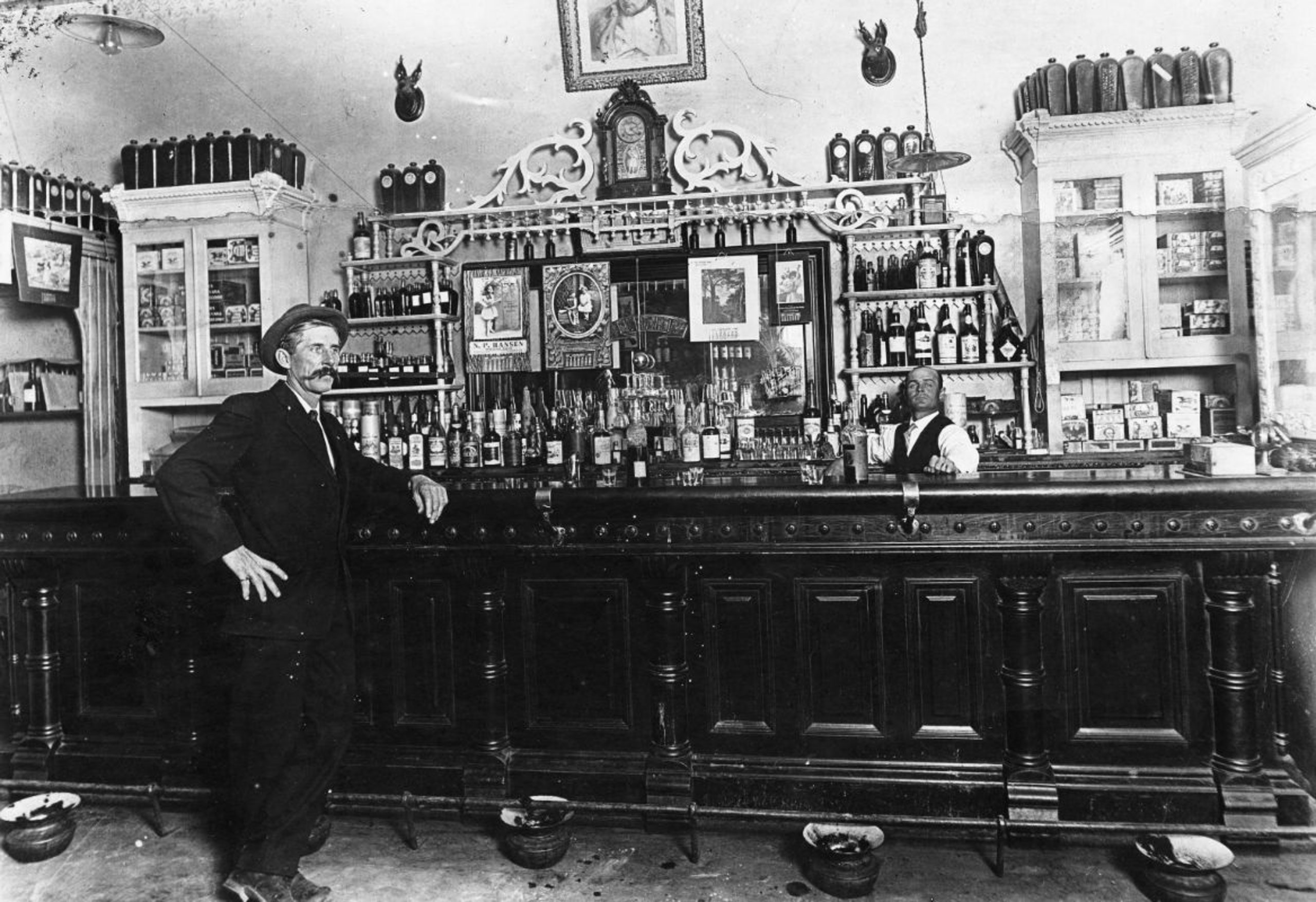 saloon with bar tender and patron